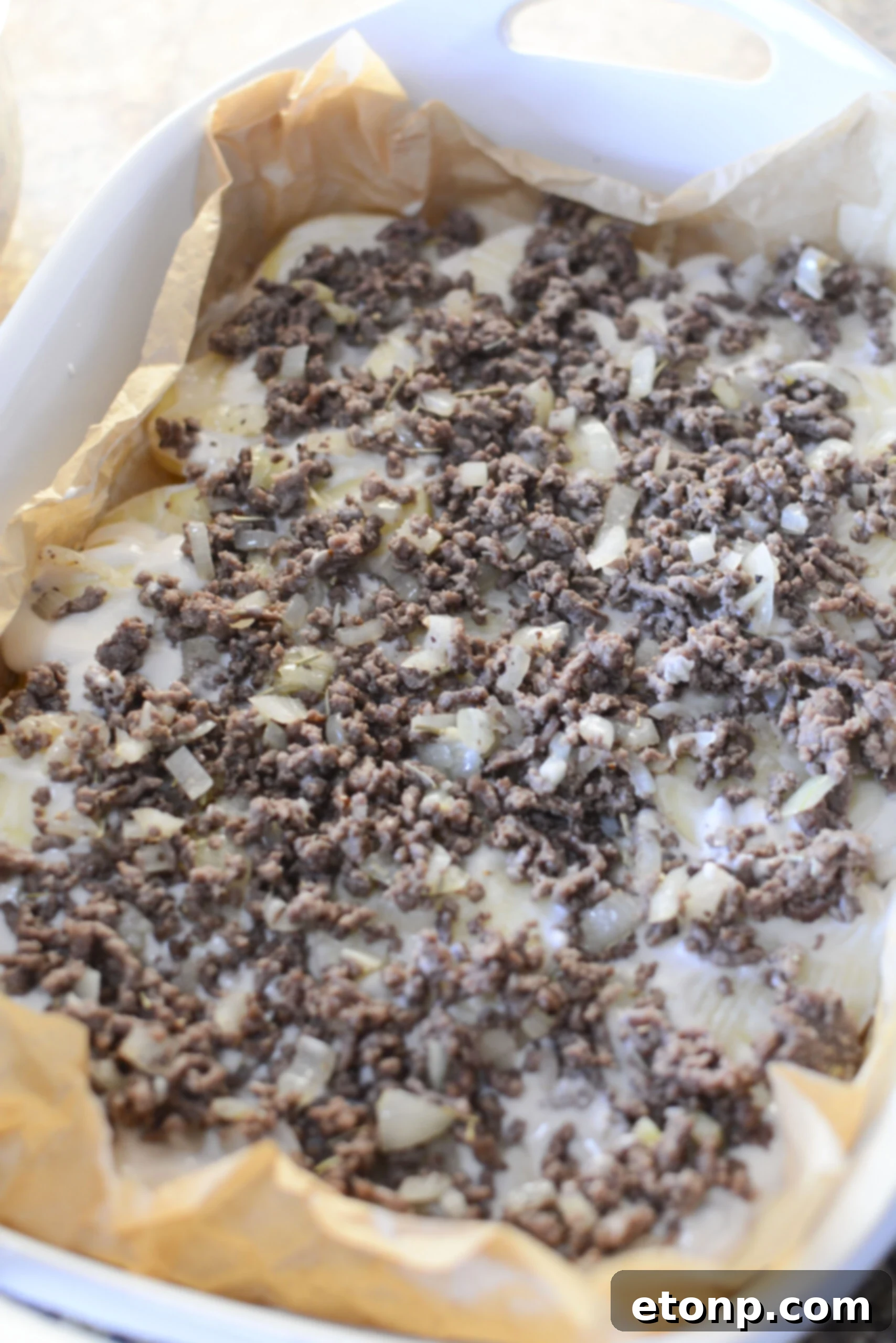 Another view of the casserole before baking, showing the layers.