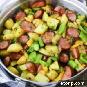 Sausage Peppers and Potatoes in a skillet