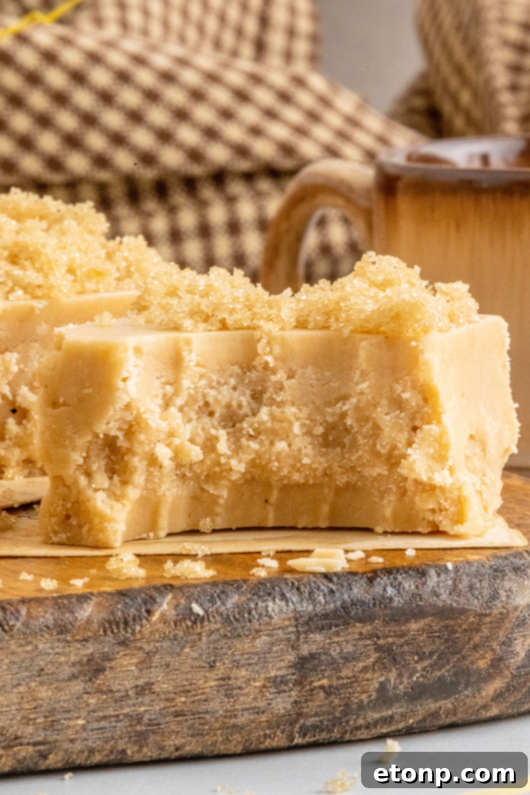 Golden Caramel Fudge 15 Up close view of Penuche Fudge with a bite removed.