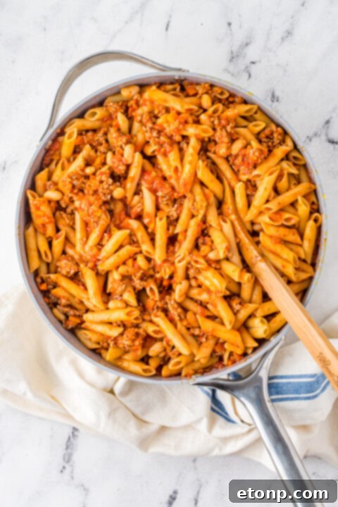 Pasta Fagioli al Forno layers assembled in a baking dish before baking.