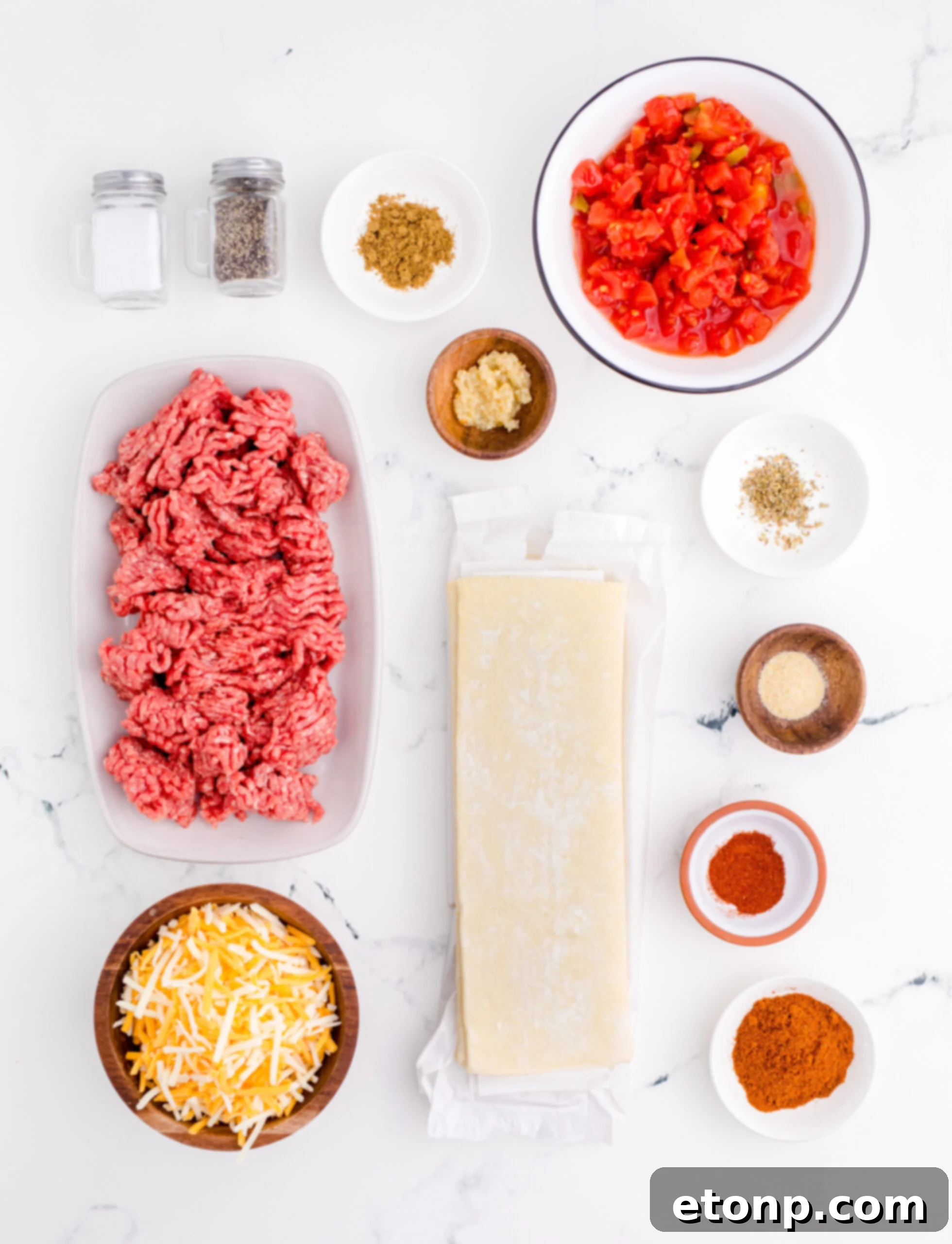 An organized overhead display of all the fresh ingredients laid out on a clean counter, ready for the Taco Pinwheel recipe preparation.
