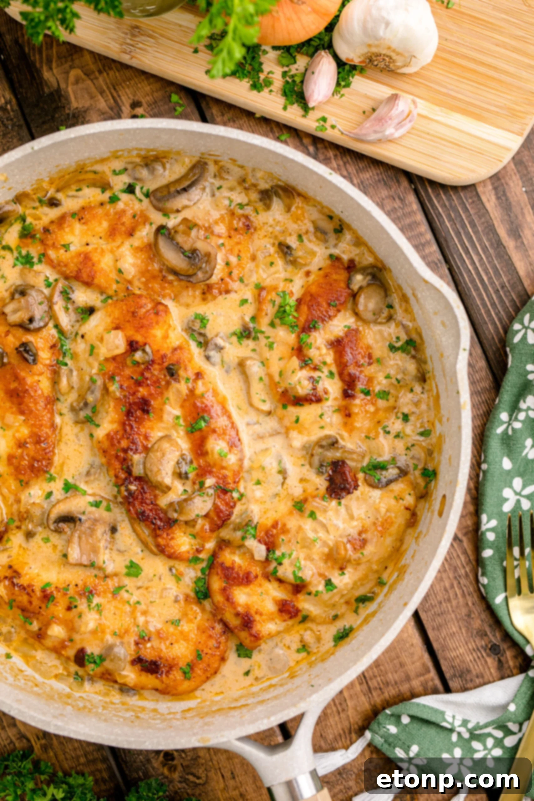 Chicken Marsala in a white skillet 