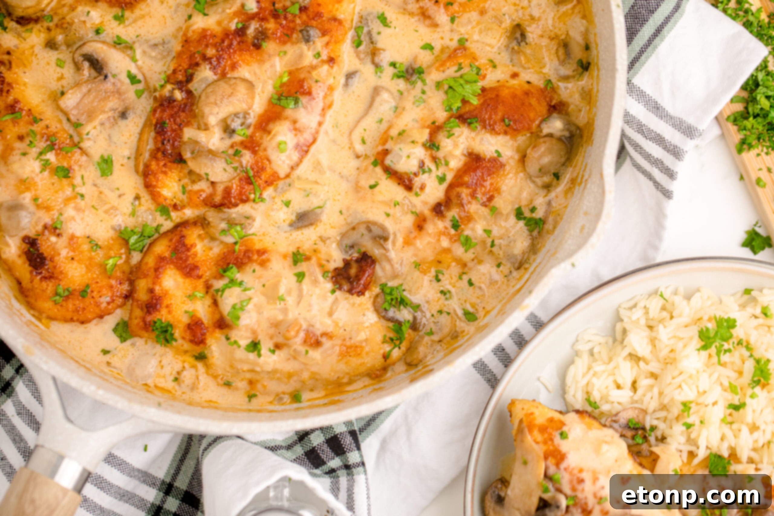 Overhead view of Chicken Marsala in a skillet.