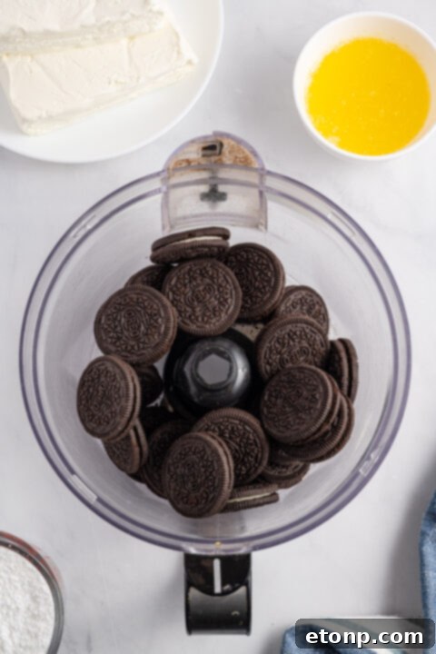 No-Bake Oreo Cheesecake Magic 8 A delicious No Bake Oreo Cheesecake, showing a close-up of its creamy texture and rich Oreo crust.