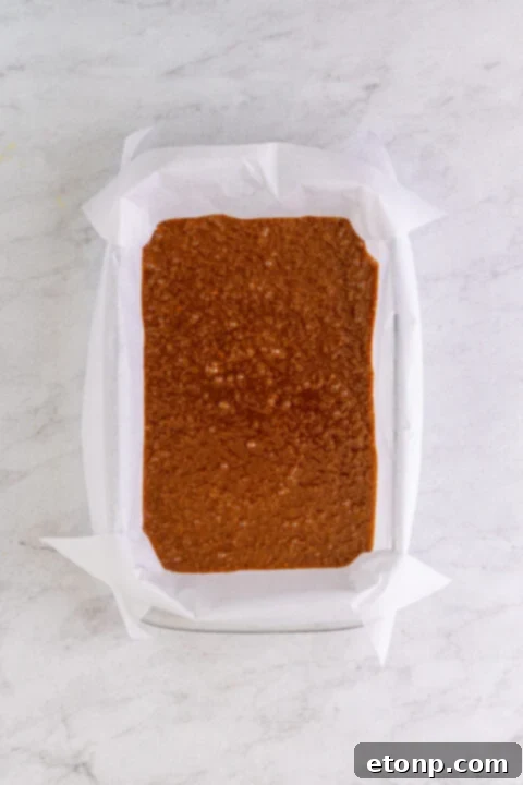 Three German Chocolate Brownies arranged to show different angles of the topping and brownie base.