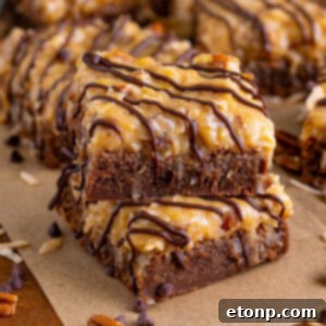 German Chocolate Brownies with a rich, dark base and a thick, textured coconut-pecan topping.