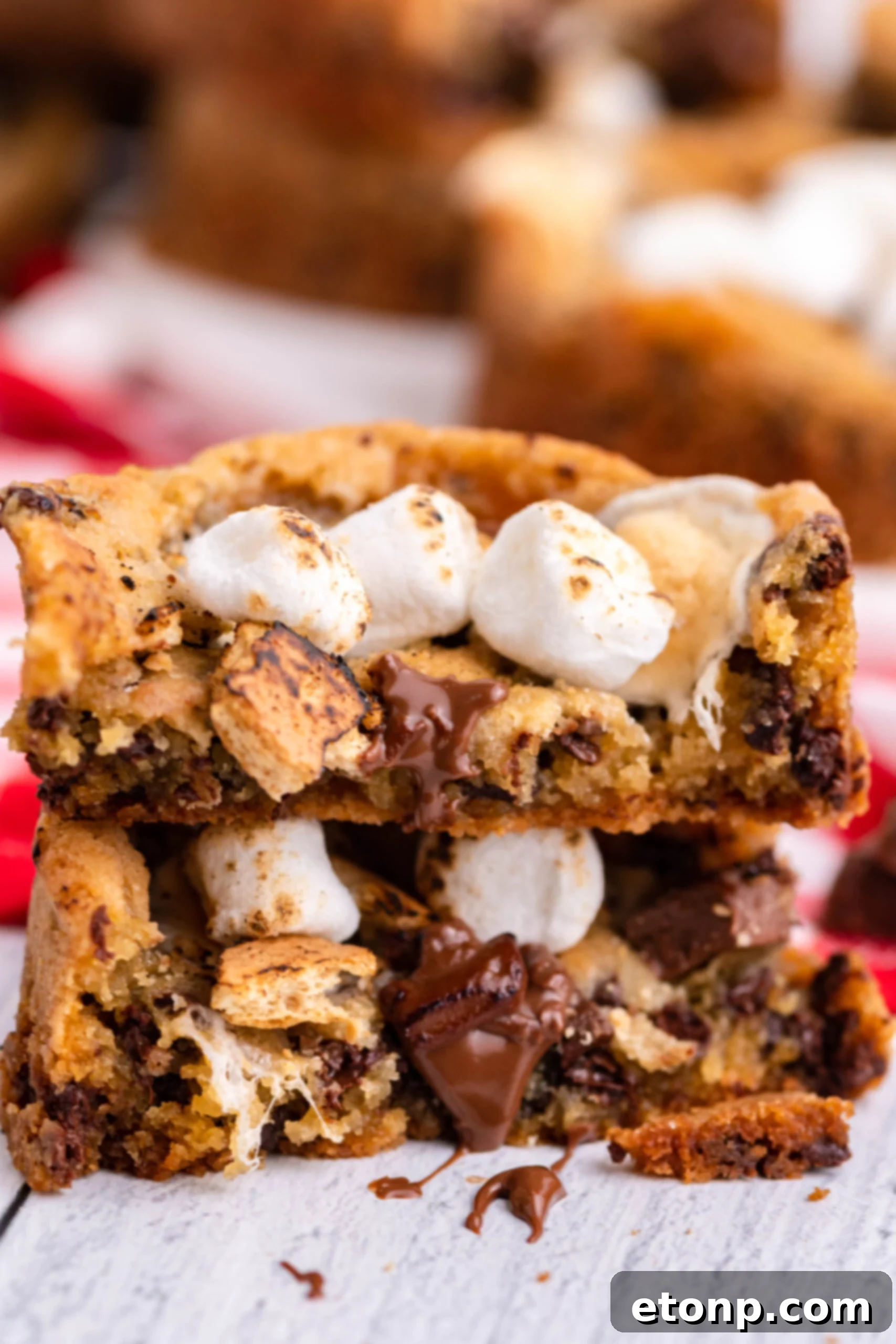 Front view of two halves of Deep Dish S’mores Cookies stacked.