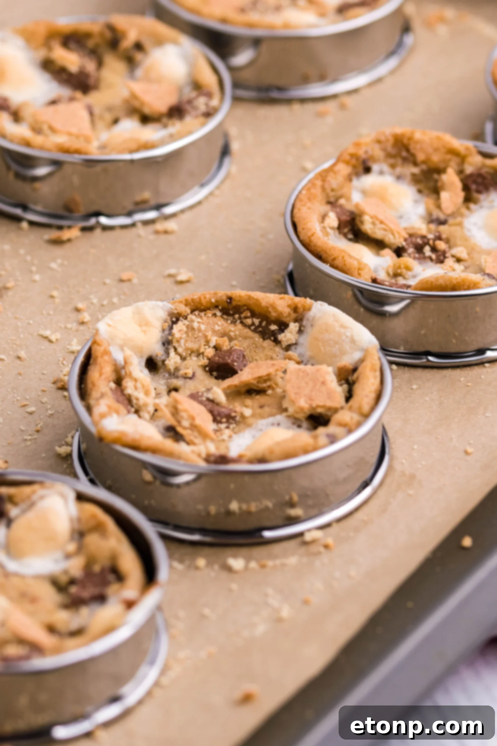 S'mores cookies inside the deep dish stainless steel pan being baked