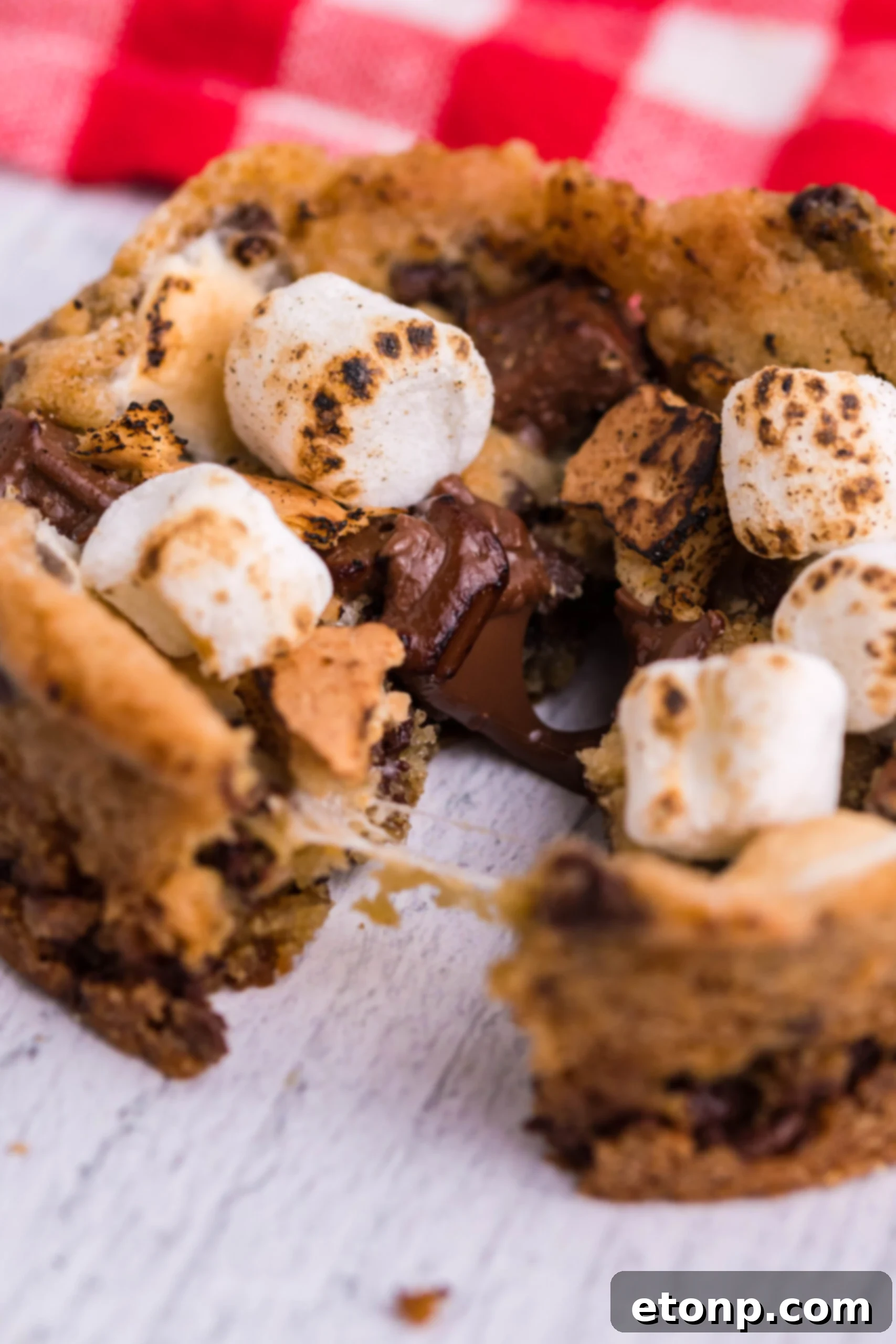Close up view of Deep Dish S’mores Cookies split in half.