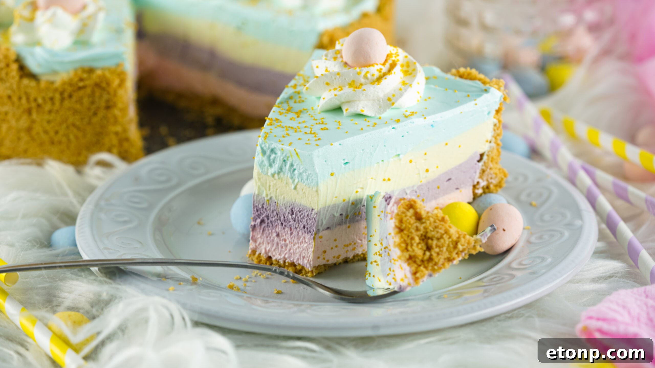 side view of Easter Kool Aid Pie slice on a blue plate