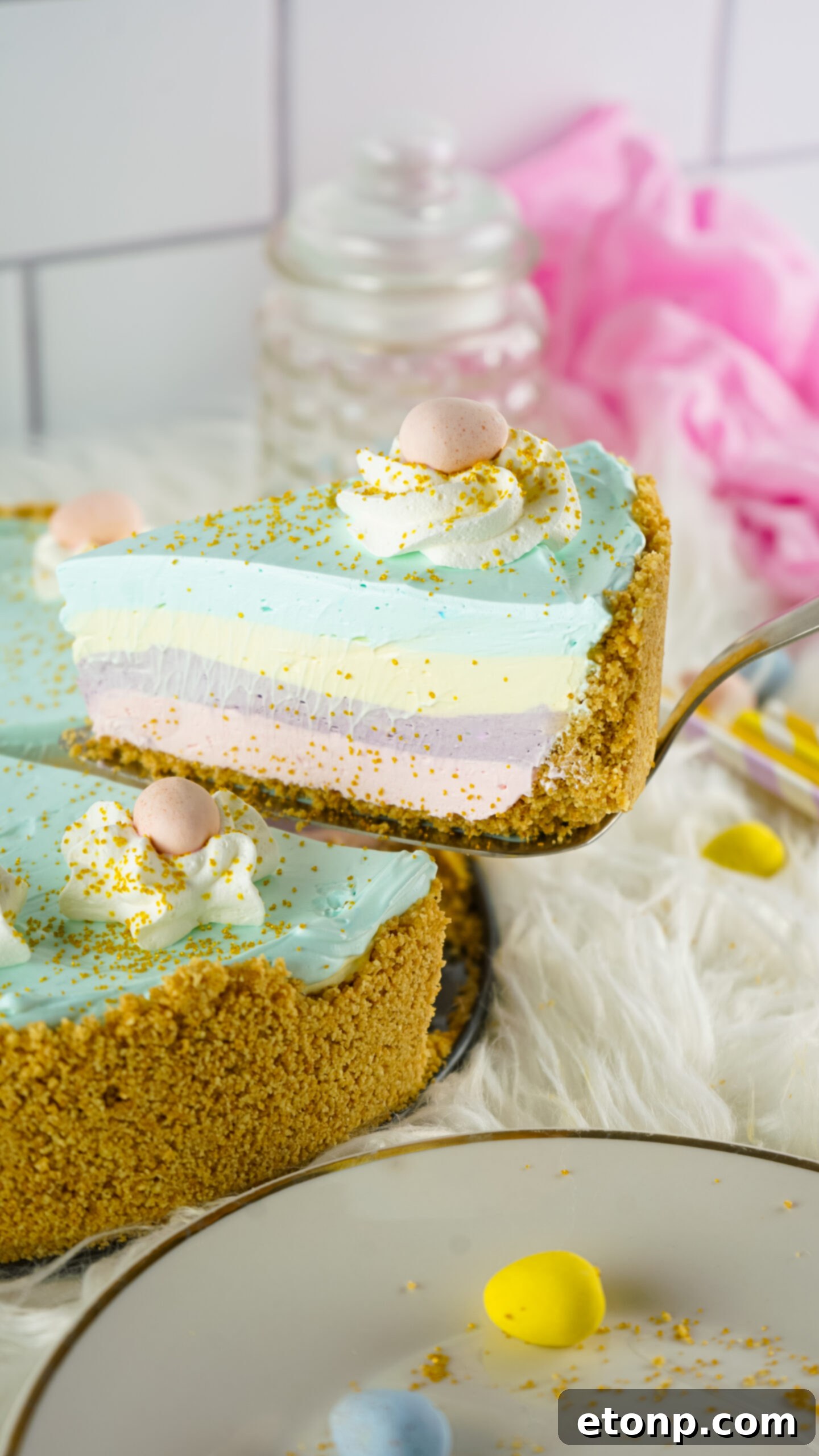 Close up view view of Easter Kool Aid Pie with a slice being lifted up on a pie server