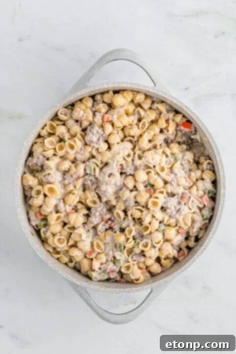 Close-up of the cheesy, meaty interior of Philly Cheesesteak Casserole.