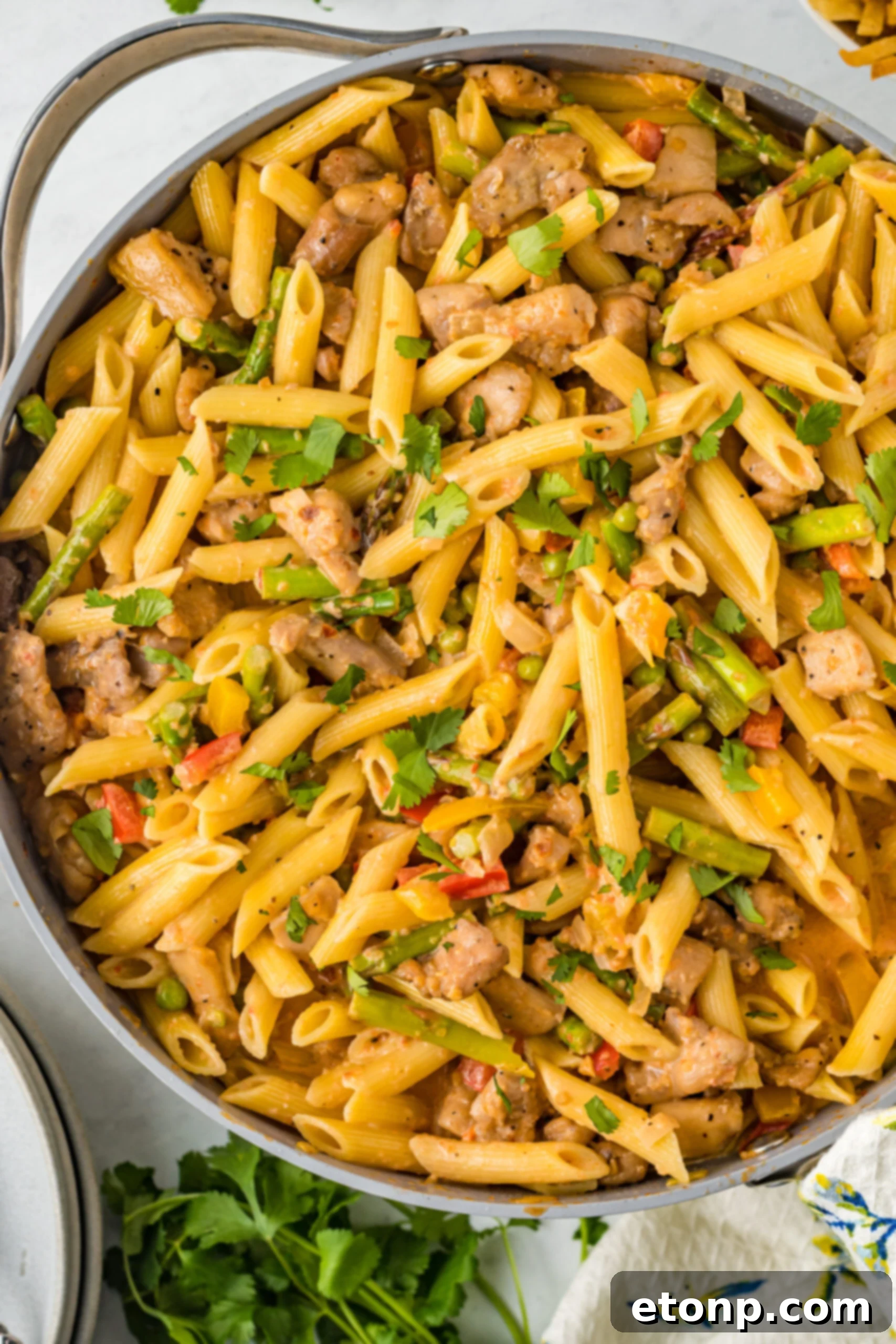 Overhead view of Cajun Chicken Pasta in a frying pan.