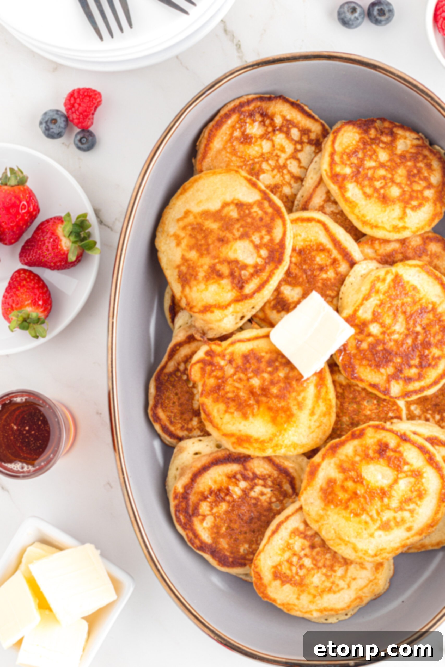 Overhead view of Mini Pancakes on a serving dish. 