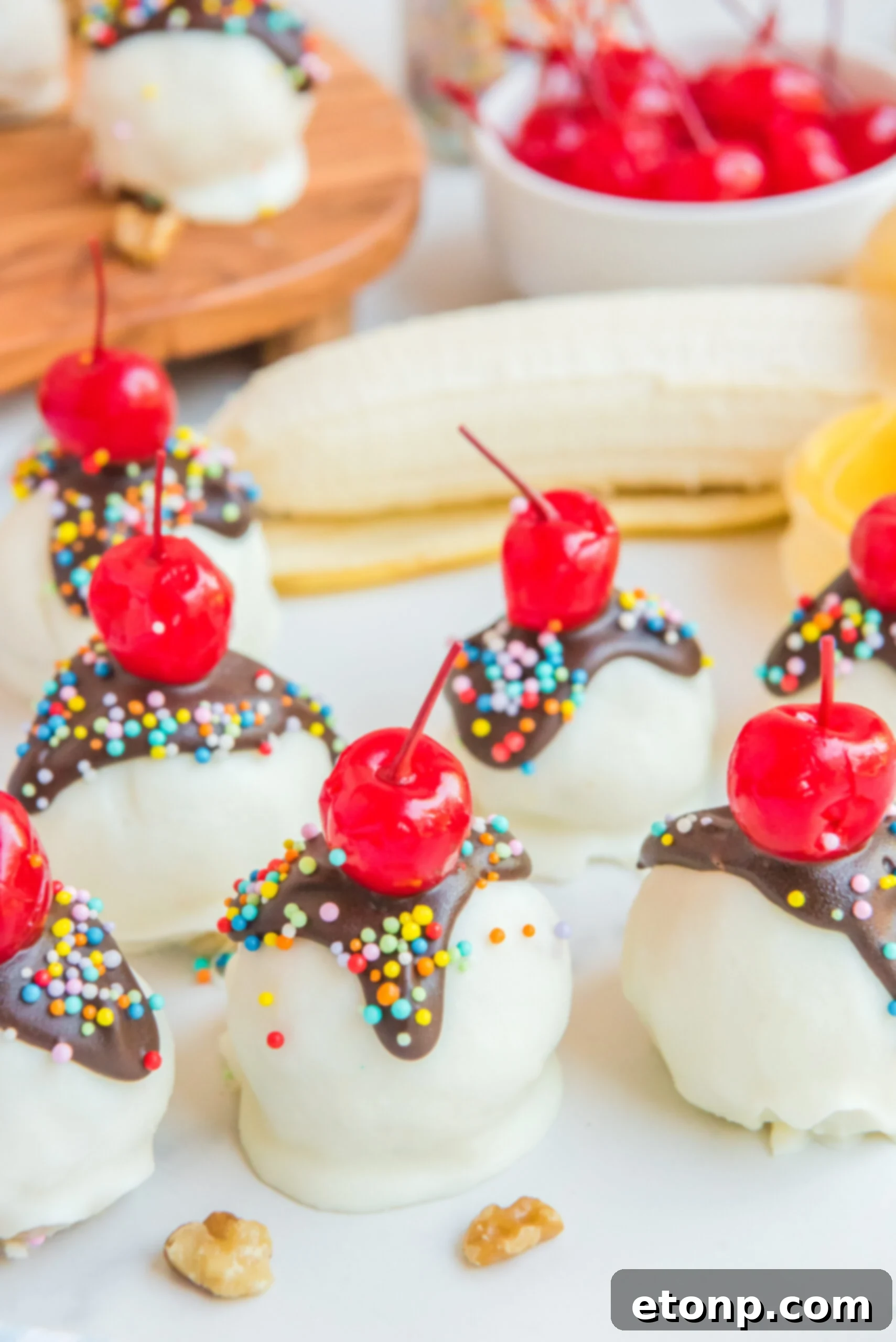 Front view of Banana Truffles surrounded by nuts.