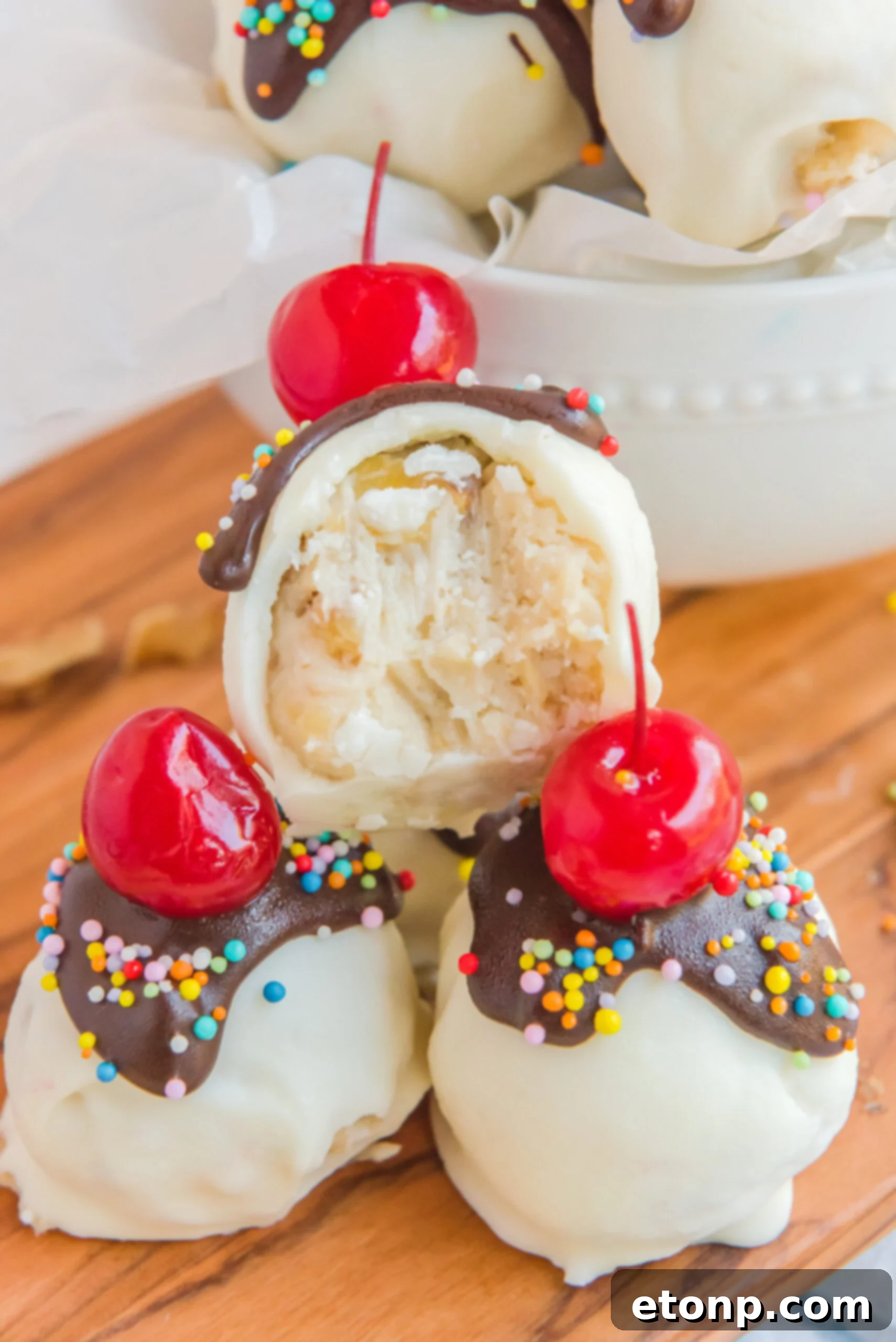 Front view of Banana Truffles with a bite taken out of the top one 