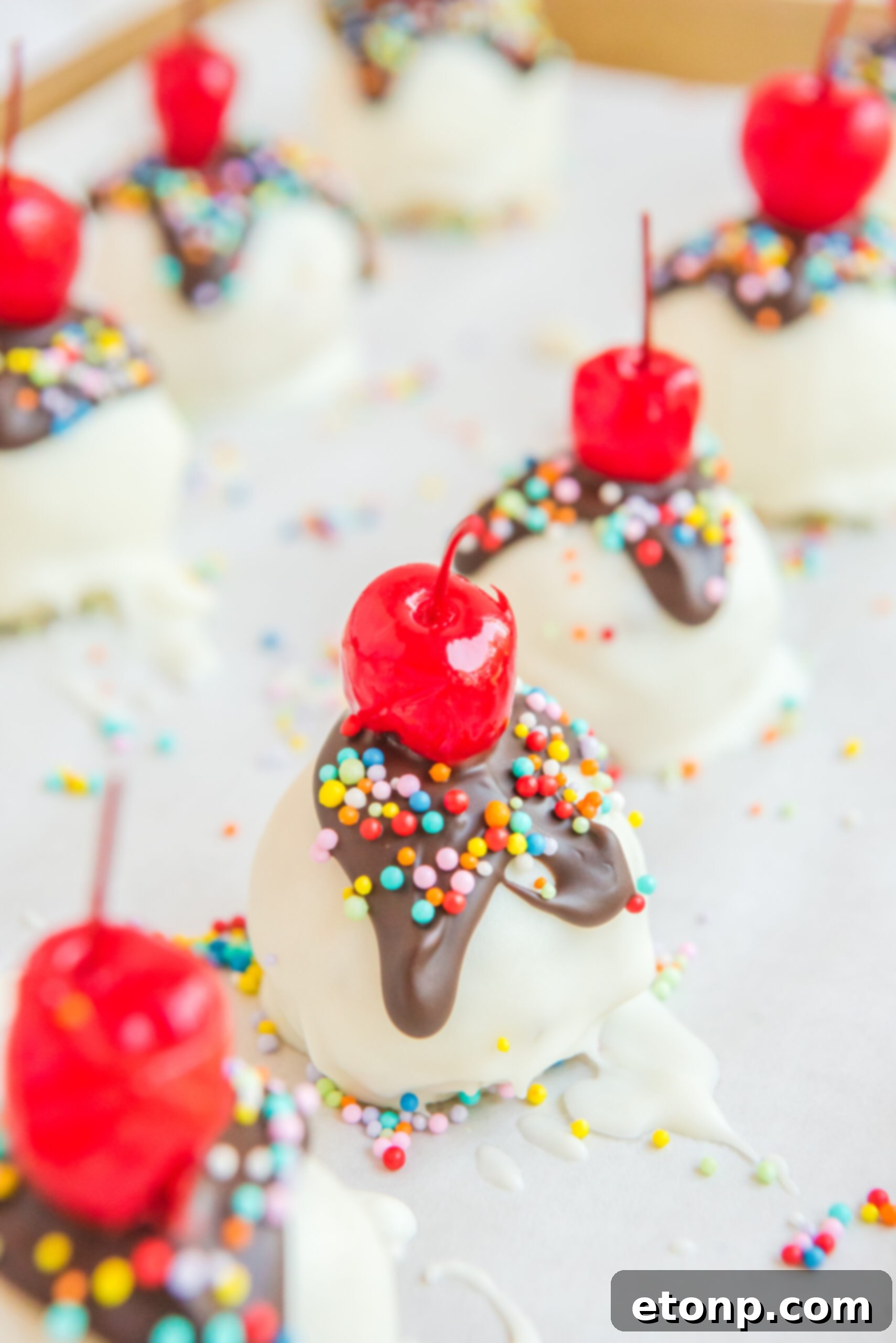 Close up view of Banana Truffles on a piece of parchment paper.