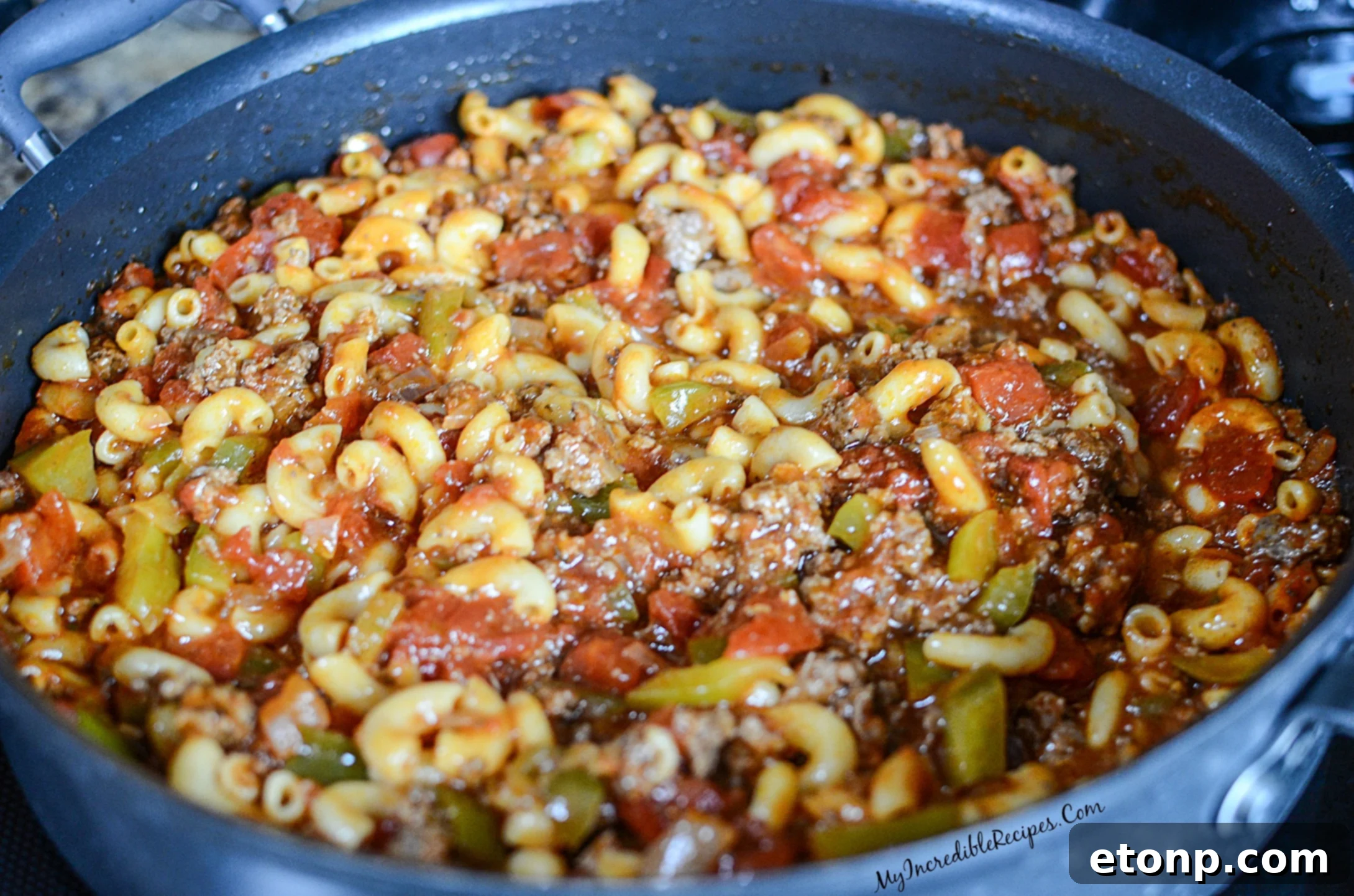 Nana's Classic American Chop Suey 12 American Chop Suey simmering with macaroni in a large pot
