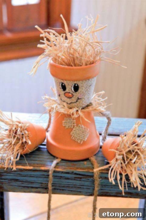 DIY pumpkin candle holders made from wine glasses for Fall centerpieces