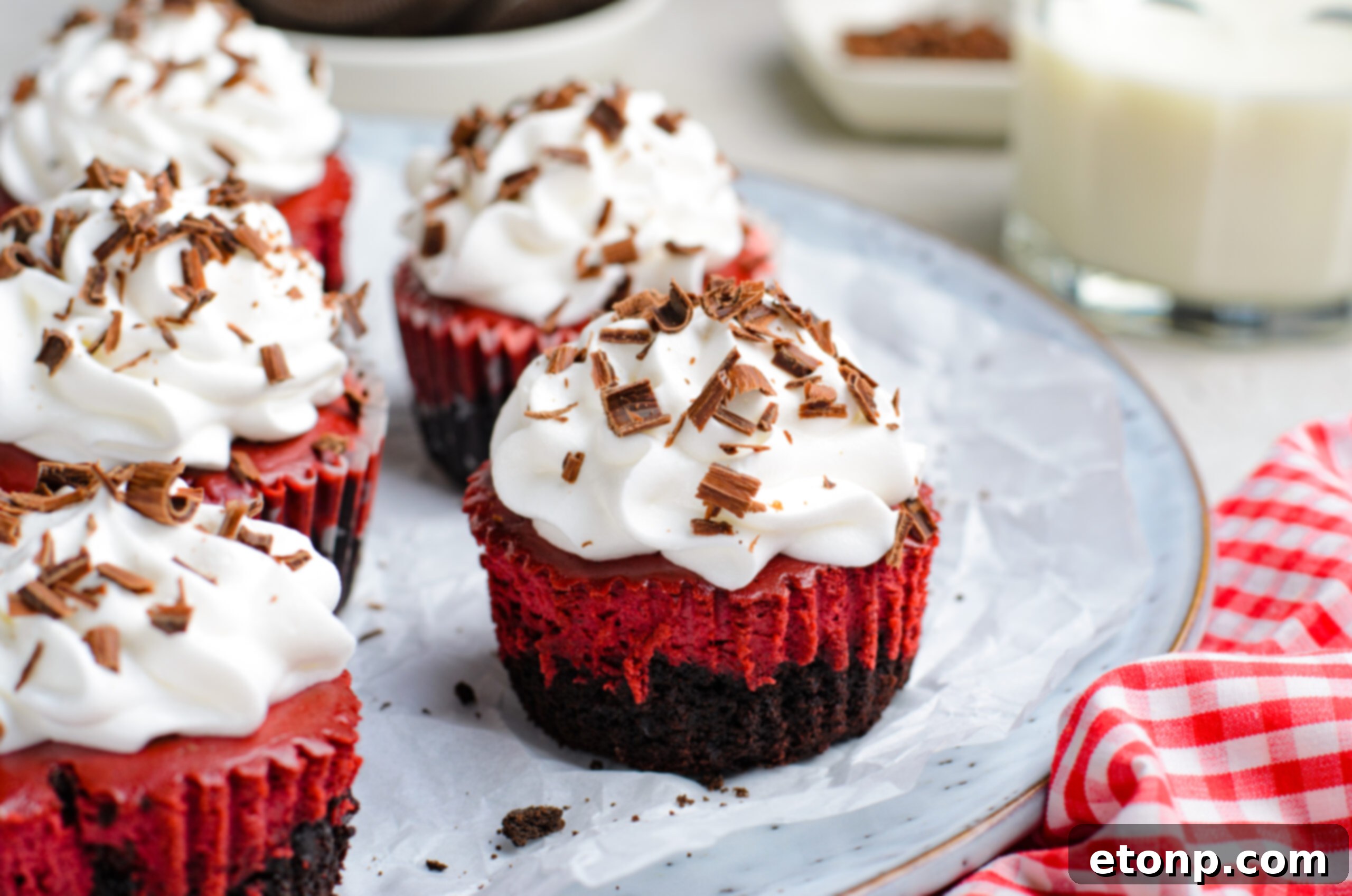 side view of the Mini Red Velvet Oreo Cheesecakes on a platter