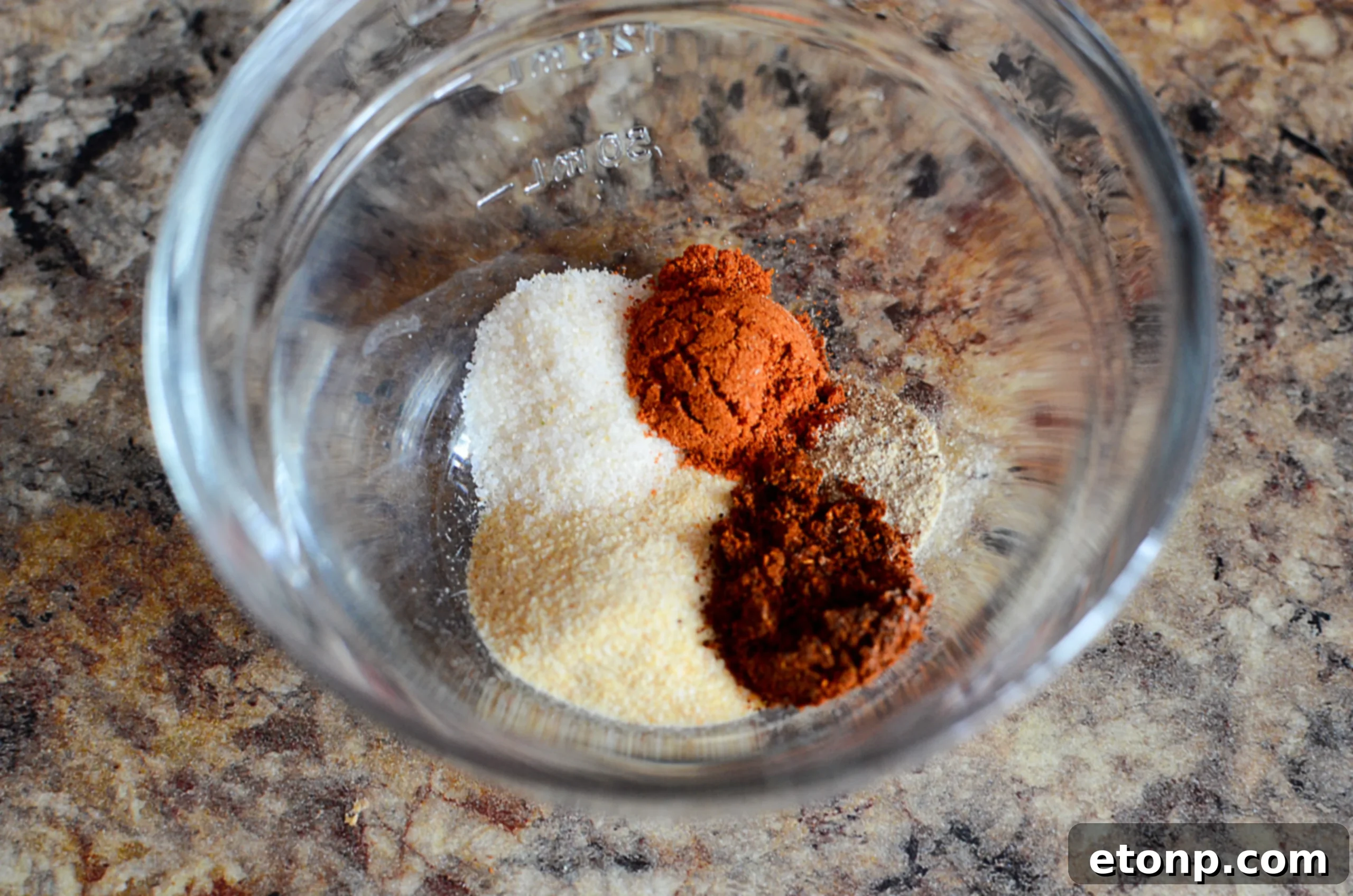 Close-up of aromatic seasoning blend for Chicken Lazone