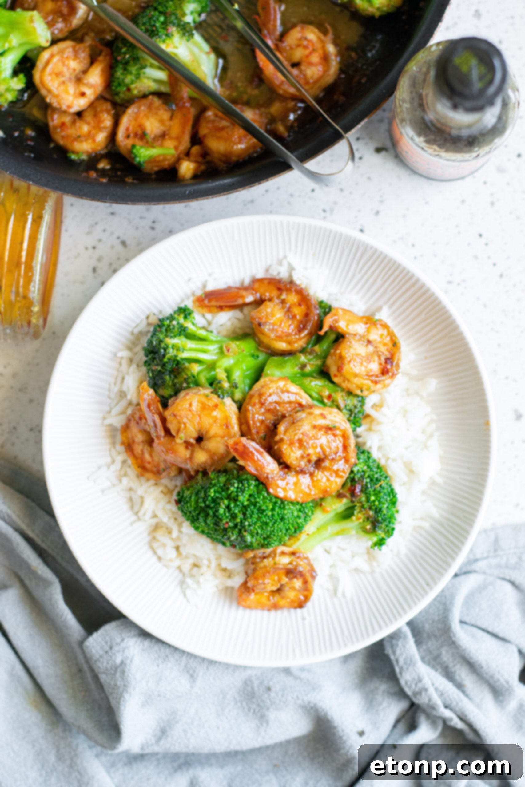 Garlic Shrimp and Broccoli Skillet 6 Overhead shot of the shrimp and broccoli plated over rice.