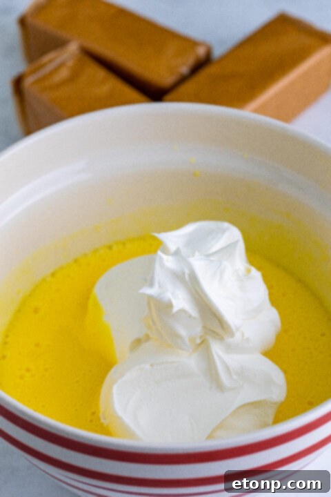 The smooth, creamy banana pudding mixture after being whisked and thickened, ready for layering.
