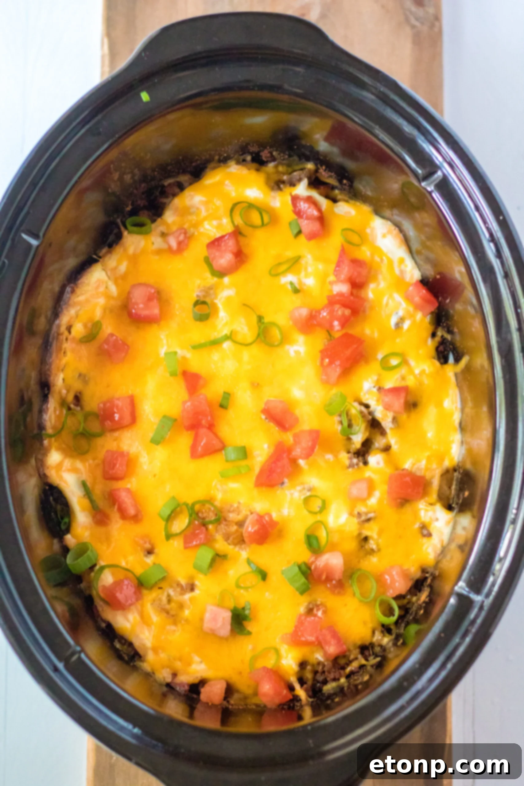 Overhead view of Slow Cooker John Wayne Casserole in a crock pot.