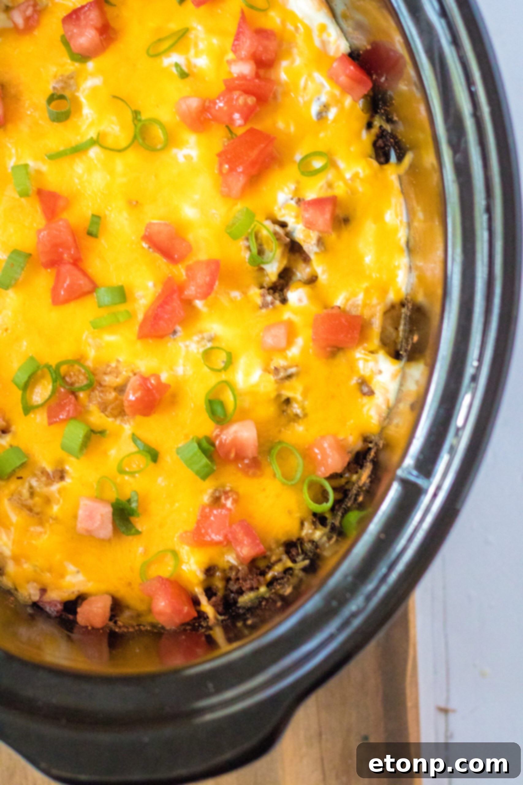 Overhead view of Slow Cooker John Wayne Casserole in a crock pot.
