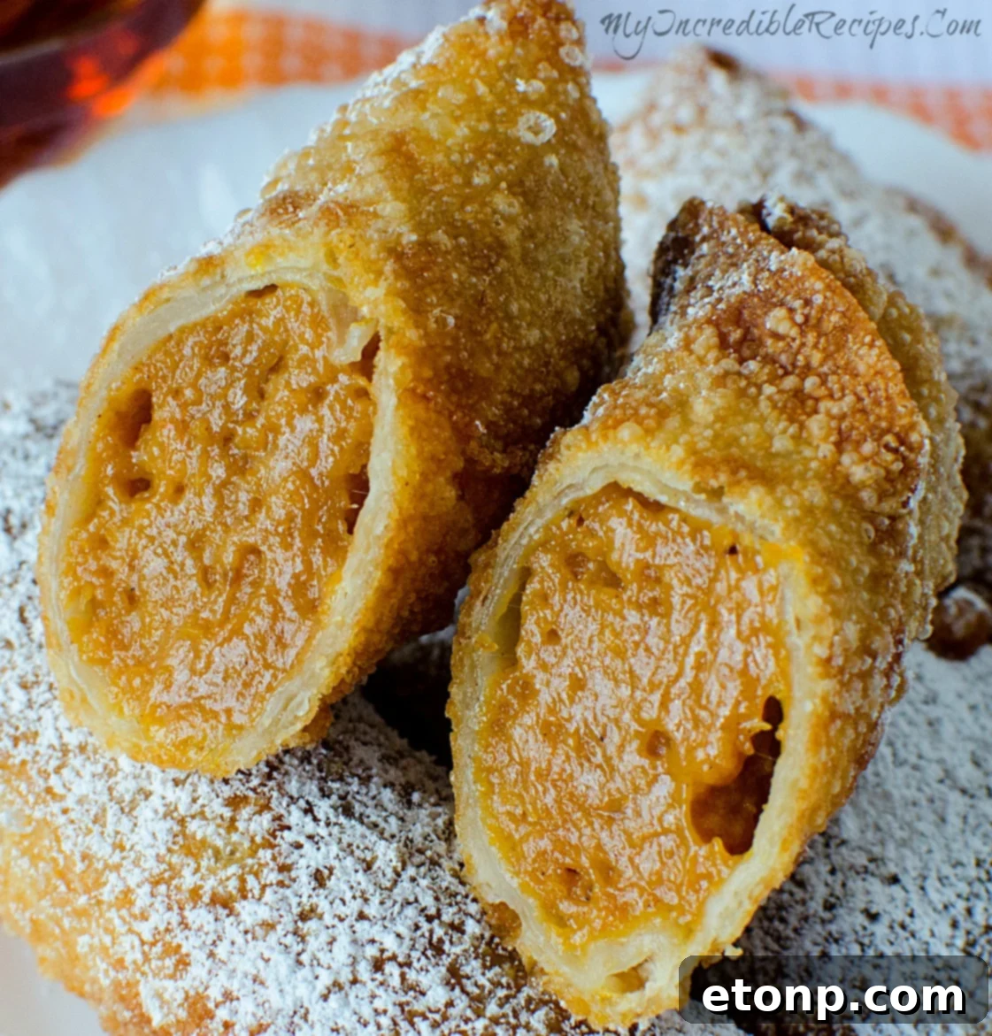 Sweet Pumpkin Pie Egg Rolls 2 Crispy Pumpkin Pie Egg Rolls with powdered sugar