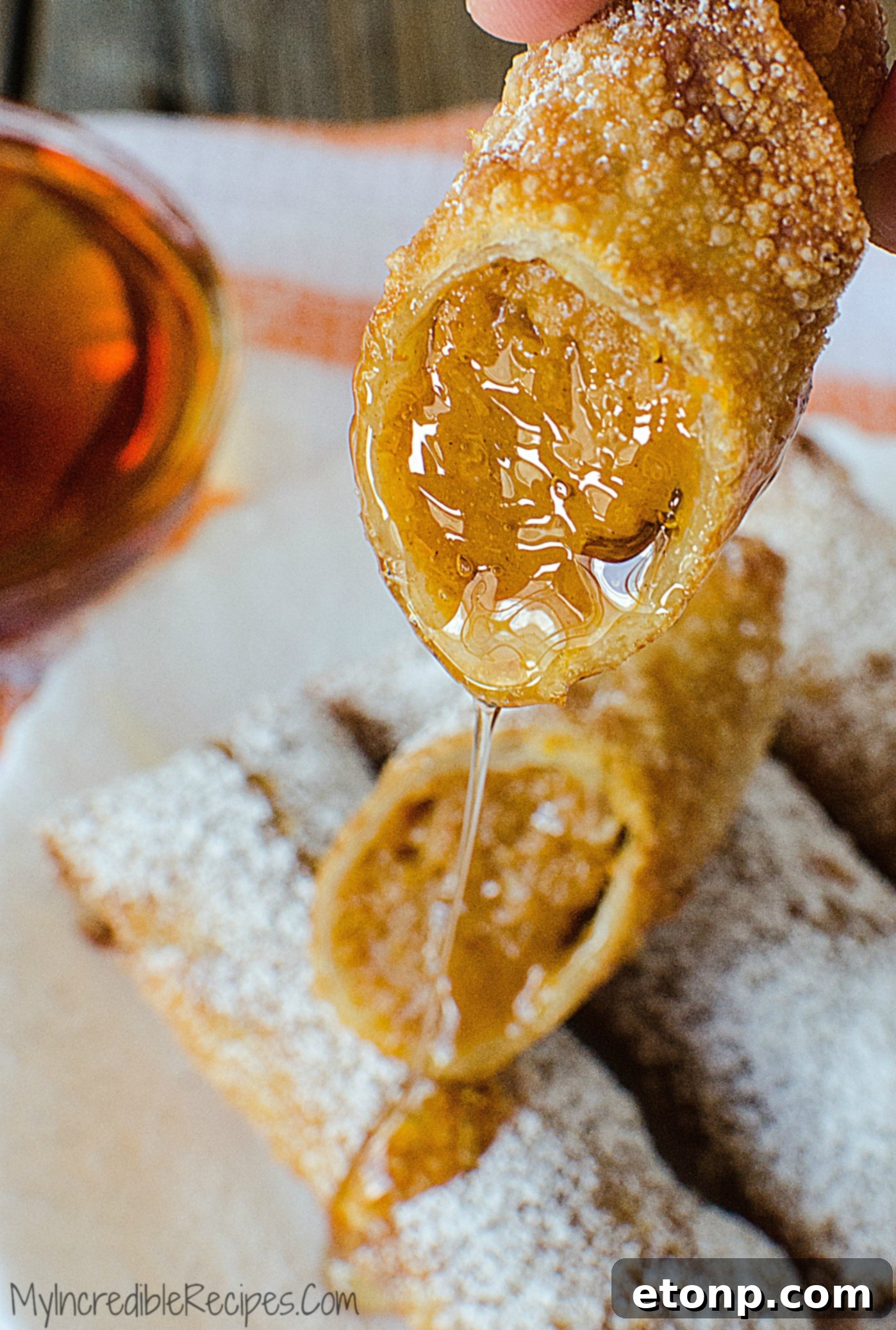 Sweet Pumpkin Pie Egg Rolls 11 Pumpkin egg rolls cooling on a rack