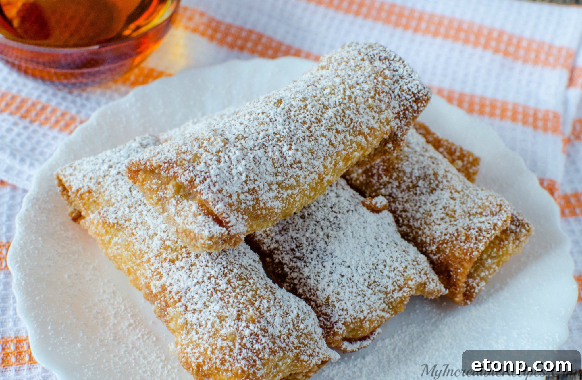 Sweet Pumpkin Pie Egg Rolls 6 Sealed pumpkin egg rolls ready for frying