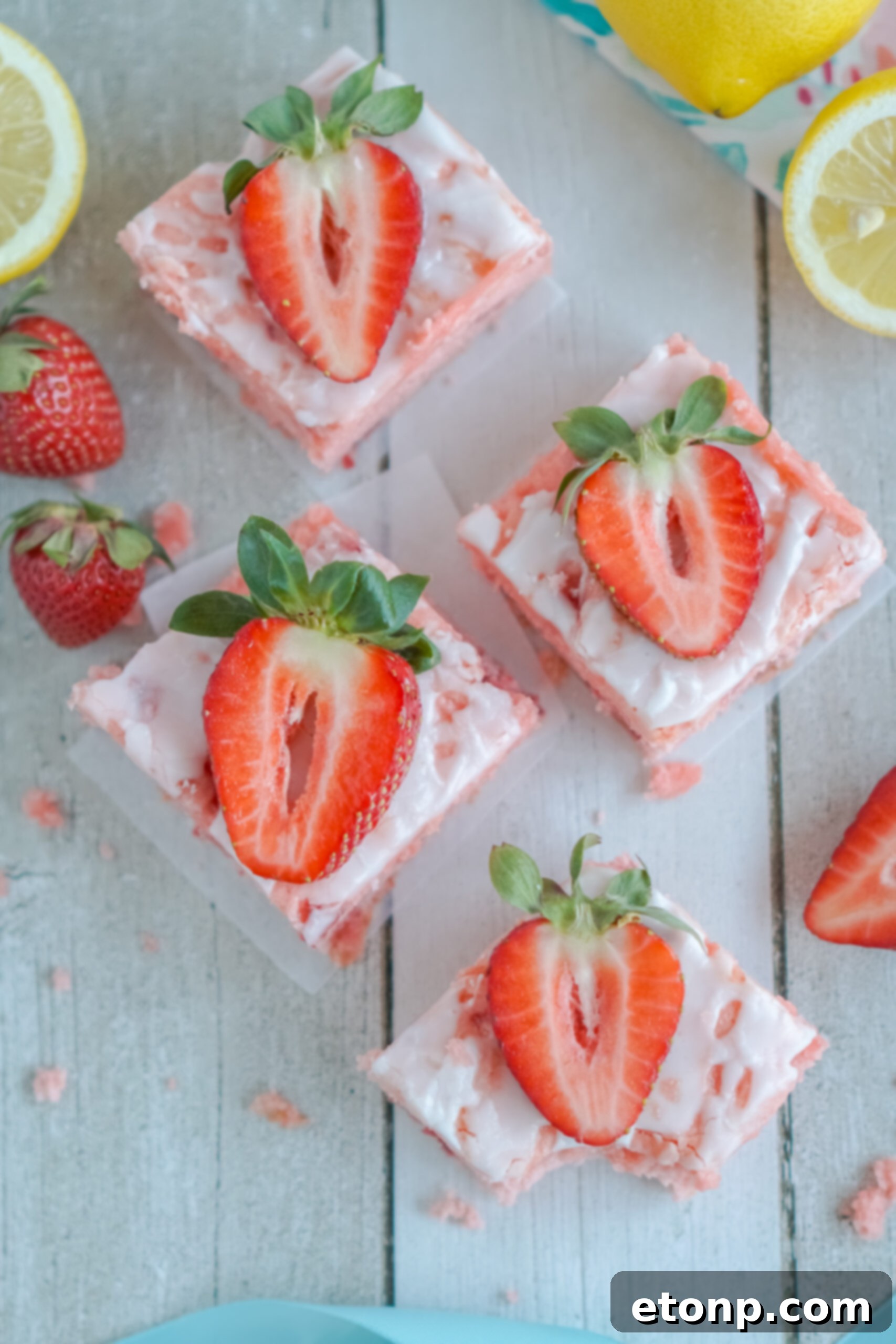 Overhead view of Strawberry Lemon Brownies on parchment paper.