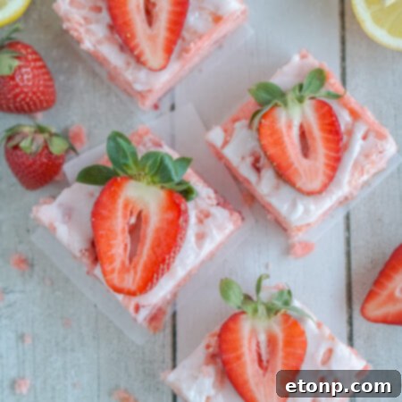 Overhead view of Strawberry Lemon Brownies on parchment paper.