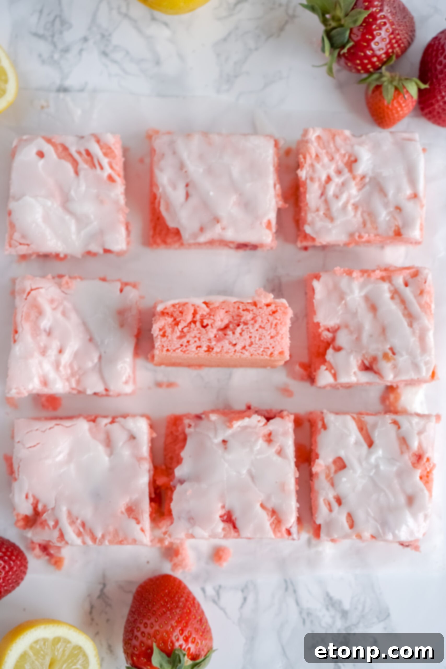 Overhead view of Strawberry Lemon Brownies on a piece of parchment paper.