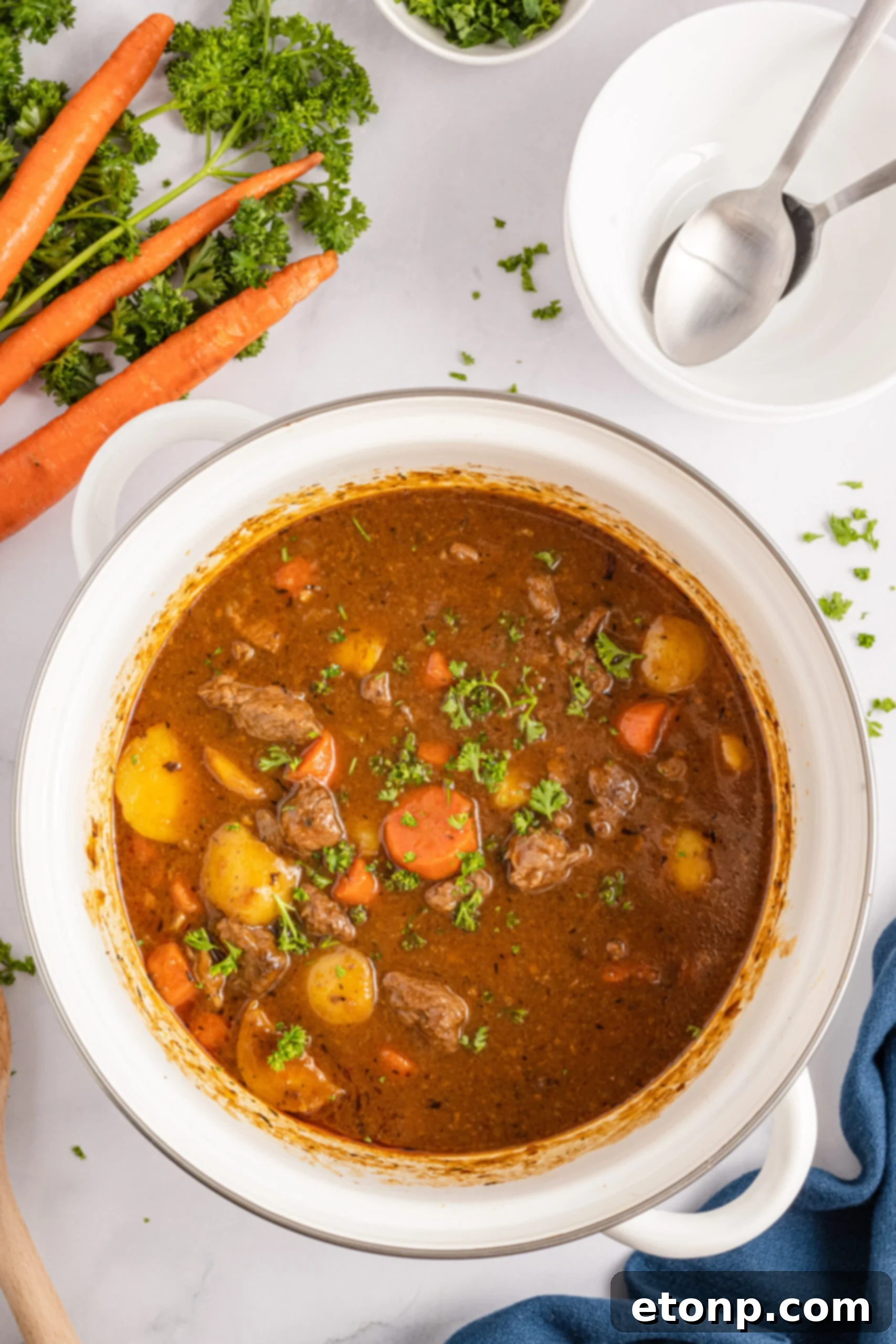 Overhead view of Irish Stew in a large cooking pot. 