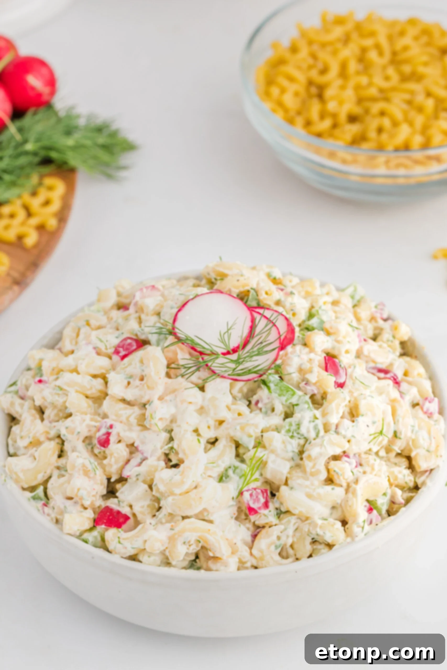 Creamy Dill Macaroni Salad 8 Front view of the vibrant Macaroni Dill Pasta Salad in a white serving bowl, ready to be served.
