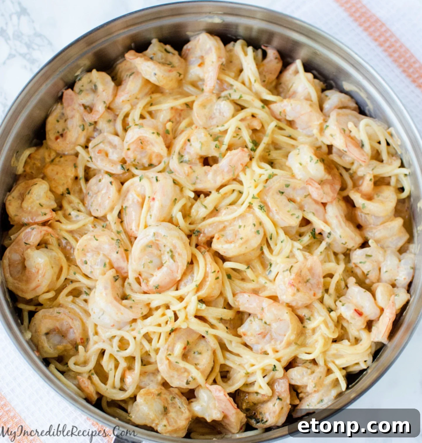 Bang Bang Shrimp Pasta served in a white bowl.
