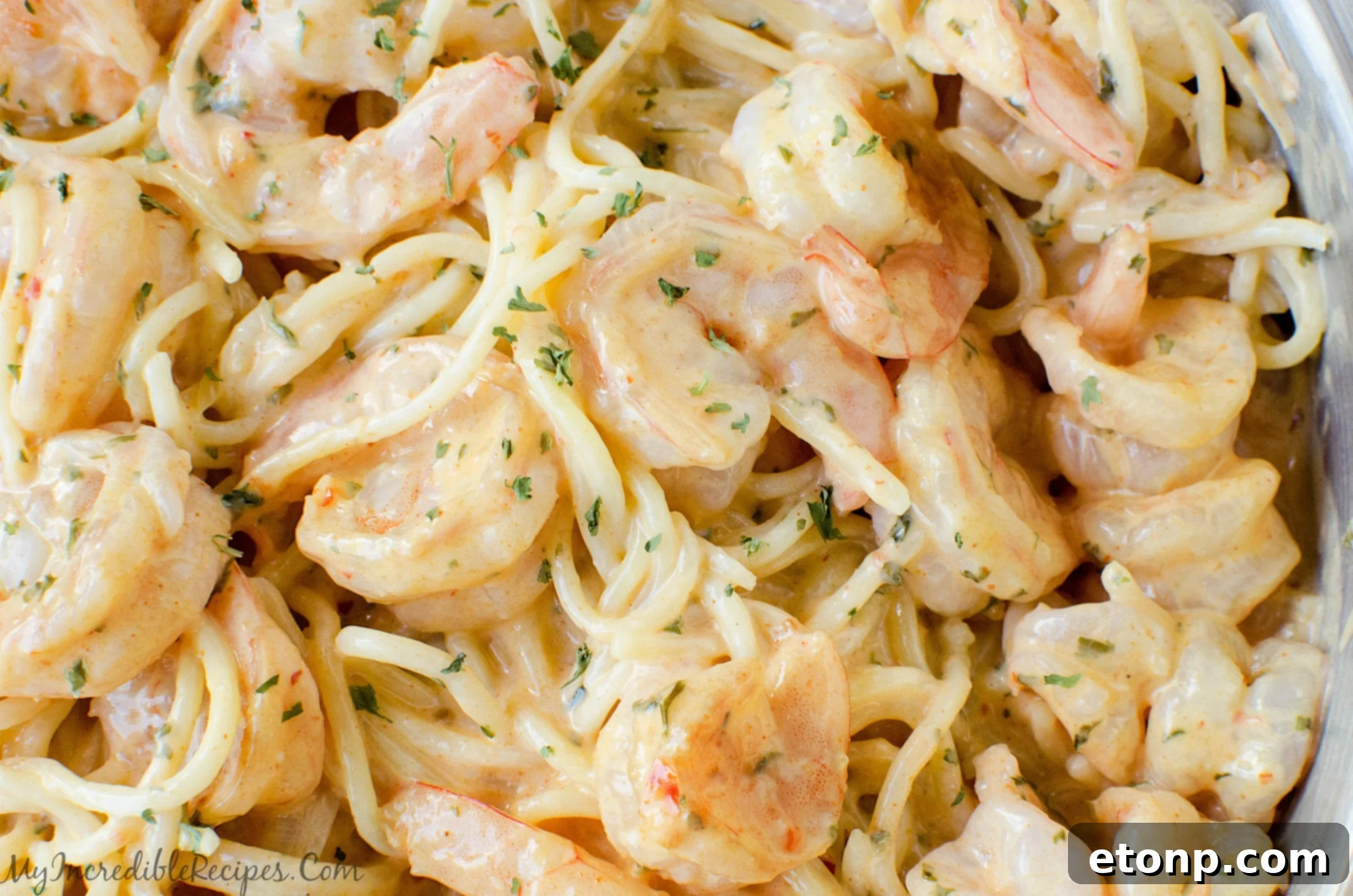 Cooked pasta, ready to be combined with the sauce and protein.