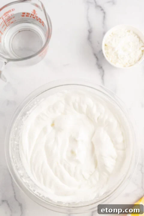 Image showing a step in making lemon meringue pie.