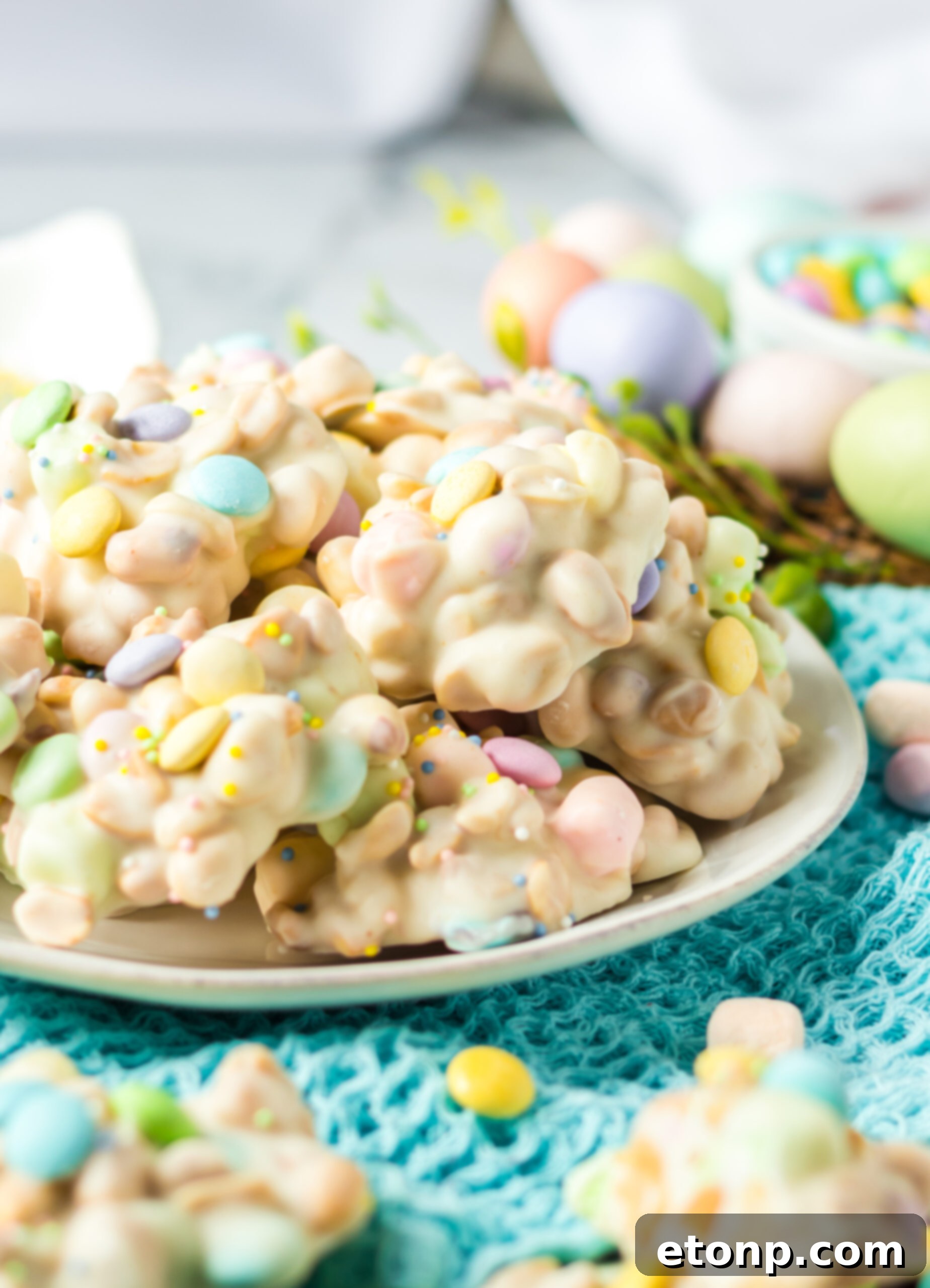Side view of the stacked candy on a white plate. 