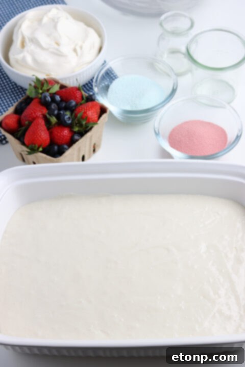 American Flag Cake in a white baking dish. 