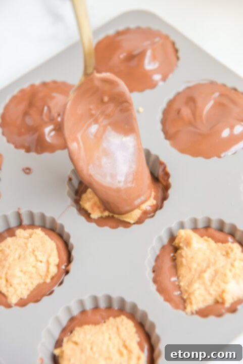 Homemade Peanut Butter Chocolate Cups 12 A selection of freshly made, perfectly set homemade peanut butter cups, just removed from their molds.