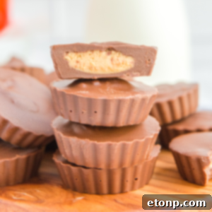 Homemade Peanut Butter Chocolate Cups 20 A close-up image of a stack of homemade Reese's Peanut Butter Cups, ready to be enjoyed.