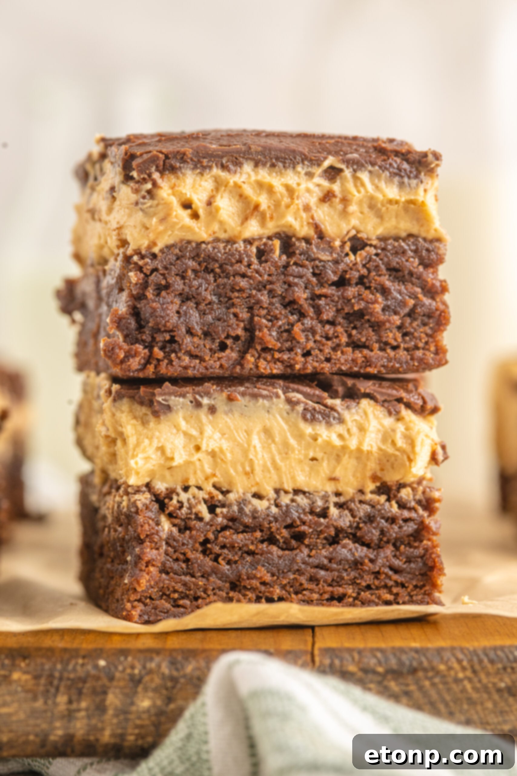 Up close shot of two Buckeye Brownies stacked on top of each other. 
