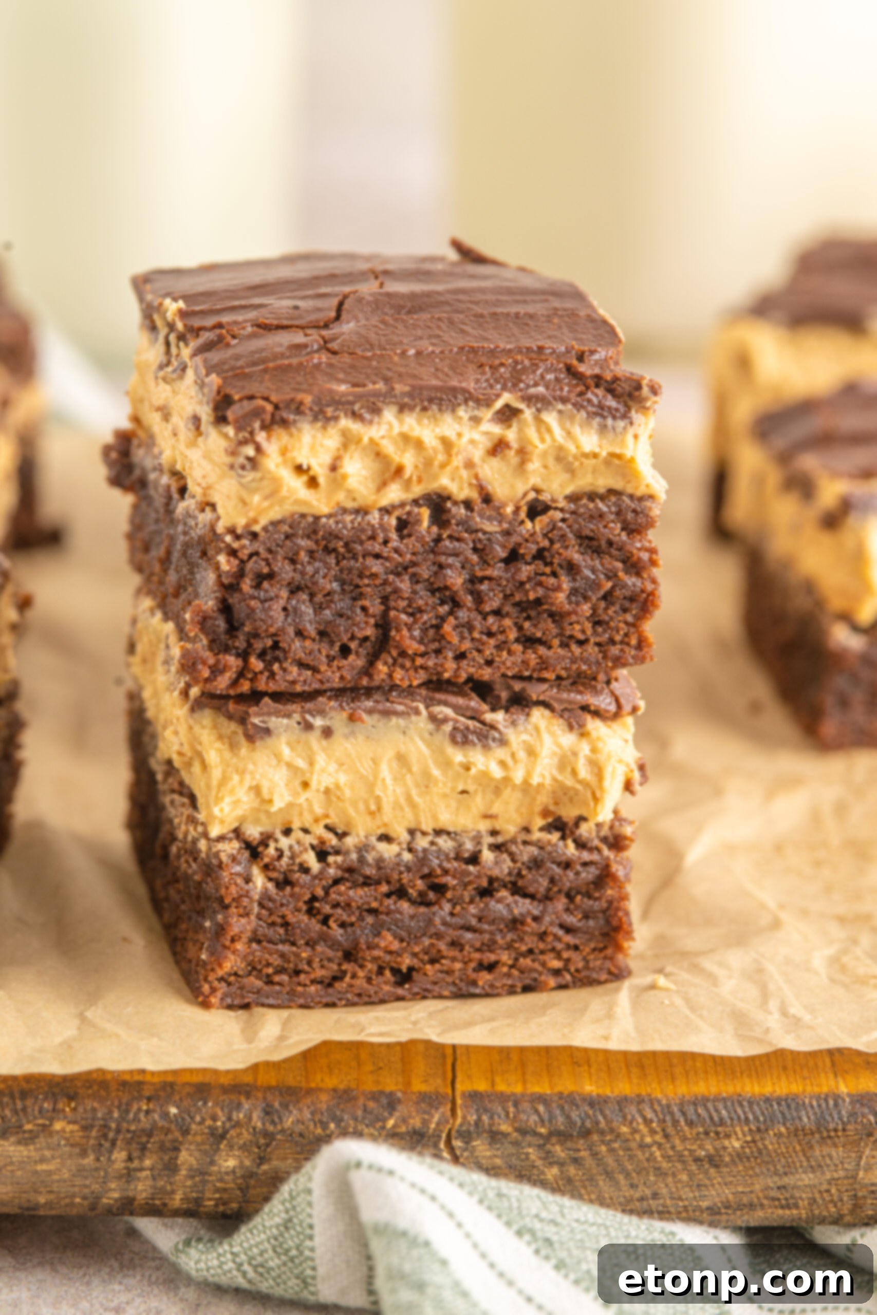 Two Buckeye Brownies stacked on top of each other. 