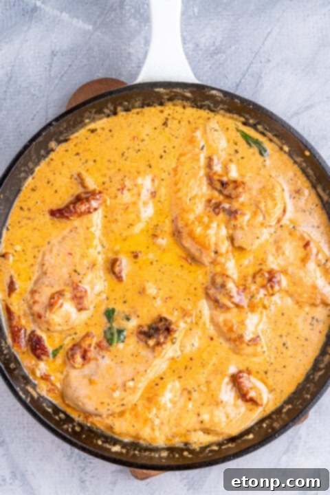 Heart-Winning Chicken 11 Folding in Parmesan cheese and fresh basil into the Marry Me Chicken sauce.