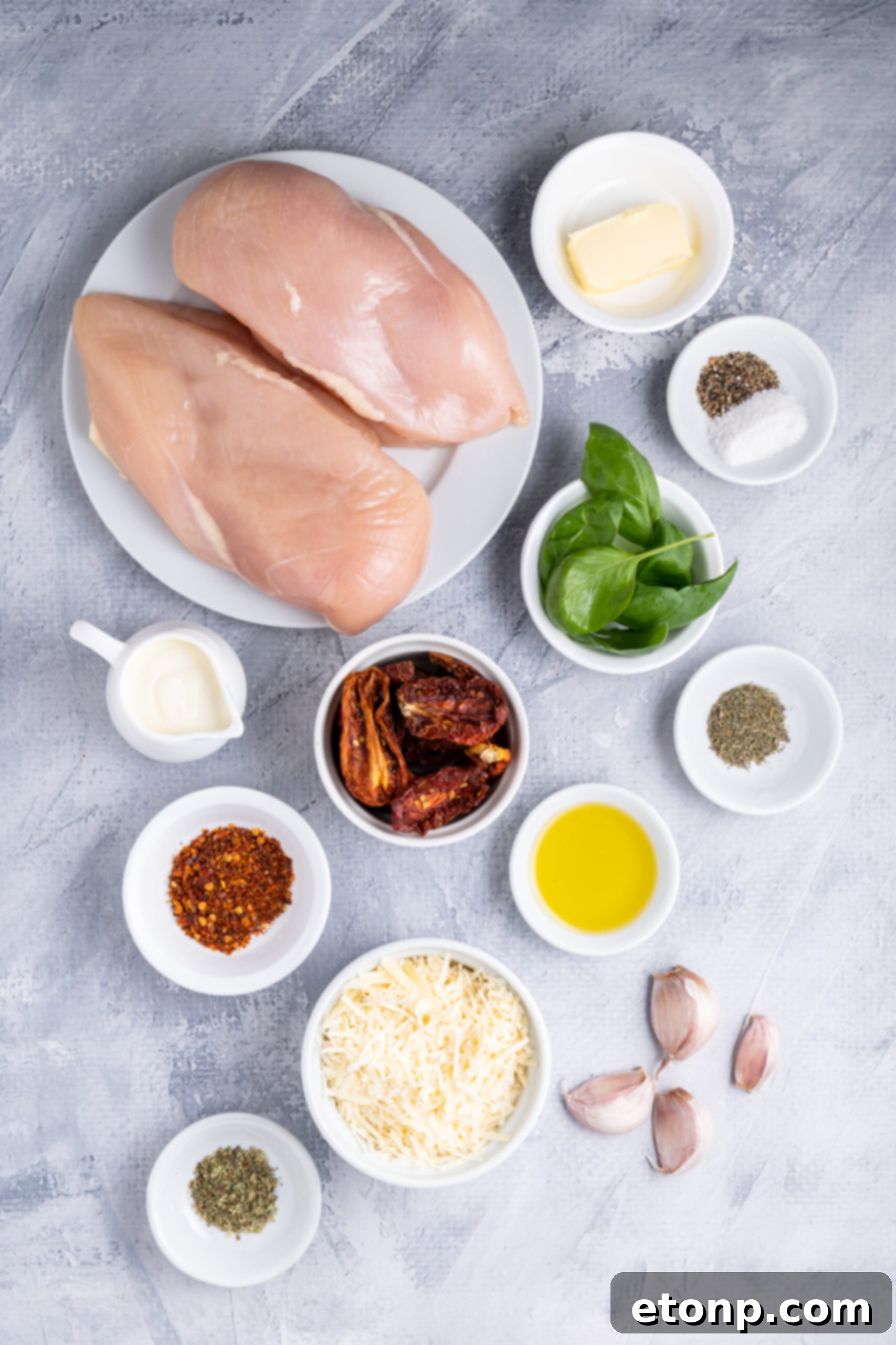 Heart-Winning Chicken 5 All fresh ingredients neatly arranged on a wooden board, ready for preparing Marry Me Chicken.