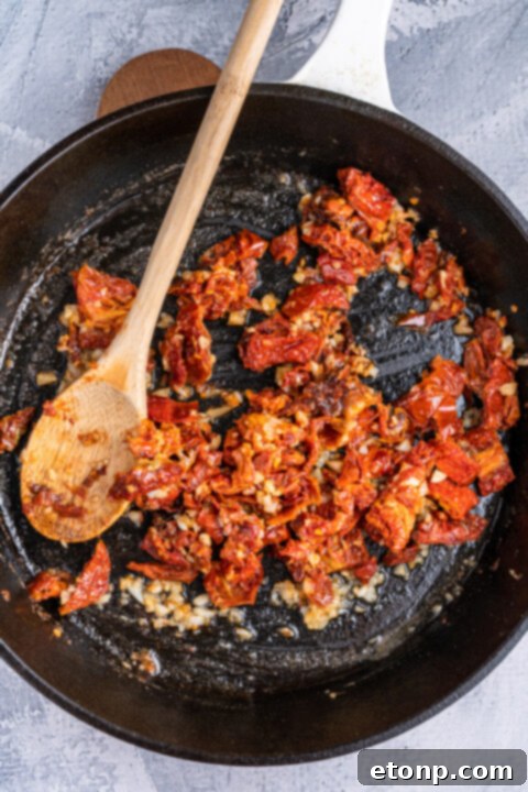 Heart-Winning Chicken 7 Searing chicken in a skillet with olive oil and butter.