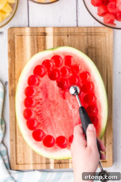 Close-up of watermelon carving detail for the turtle shell pattern.